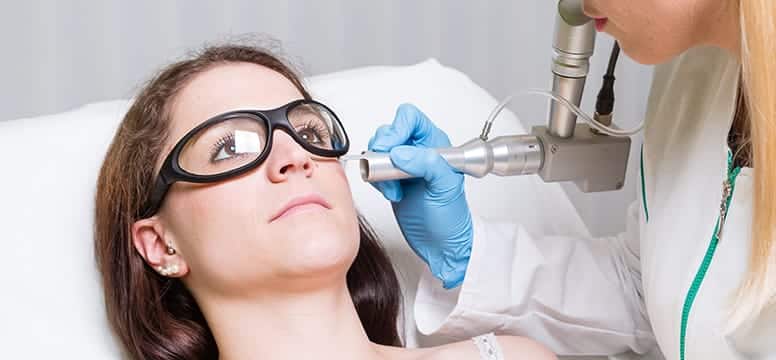 Woman undergoing Laser Skin Rejuvenation treatments at Rendon Center
