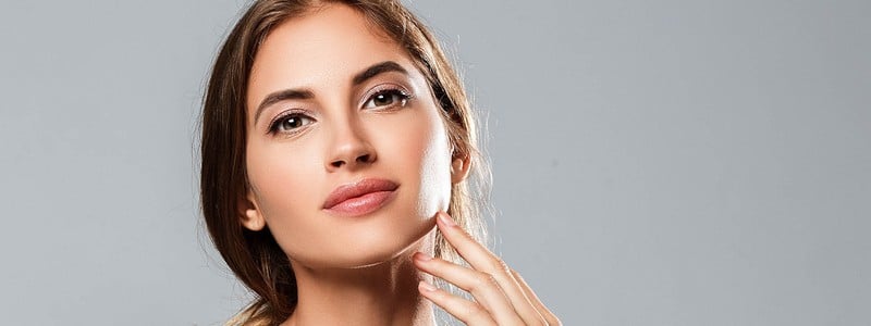 Young adult woman in black clothes dress portrait.